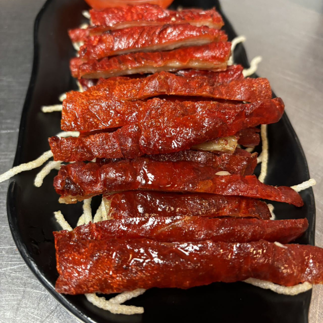 京都炸大腸Gefrituurde dikke darm met zoetzure King do saus met bami